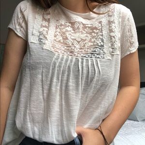 Beautiful white blouse with lace details